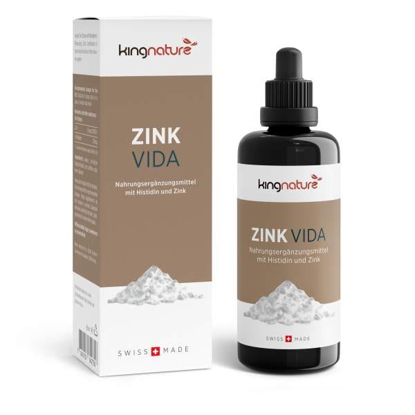 ZinkVida_BoxBottle_De_White Eine Flasche und eine Schachtel des Nahrungsergänzungsmittels Zink Vida mit Tropfverschluss und der Aufschrift „mit Histidin und Zink, Swiss Made“ sind neben einem Bild eines weißen Pulvers zu sehen.